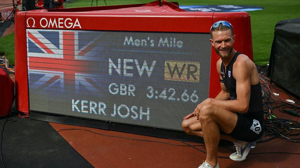 Josh Kerr celebrates after setting the mile world record of 3 minutes 42.66 seconds in London in 2026.